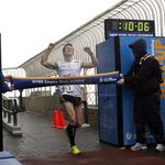 Thomas Dold, of Germany, crosses the finish line to win the men's division of the Empire State Building Run-Up.